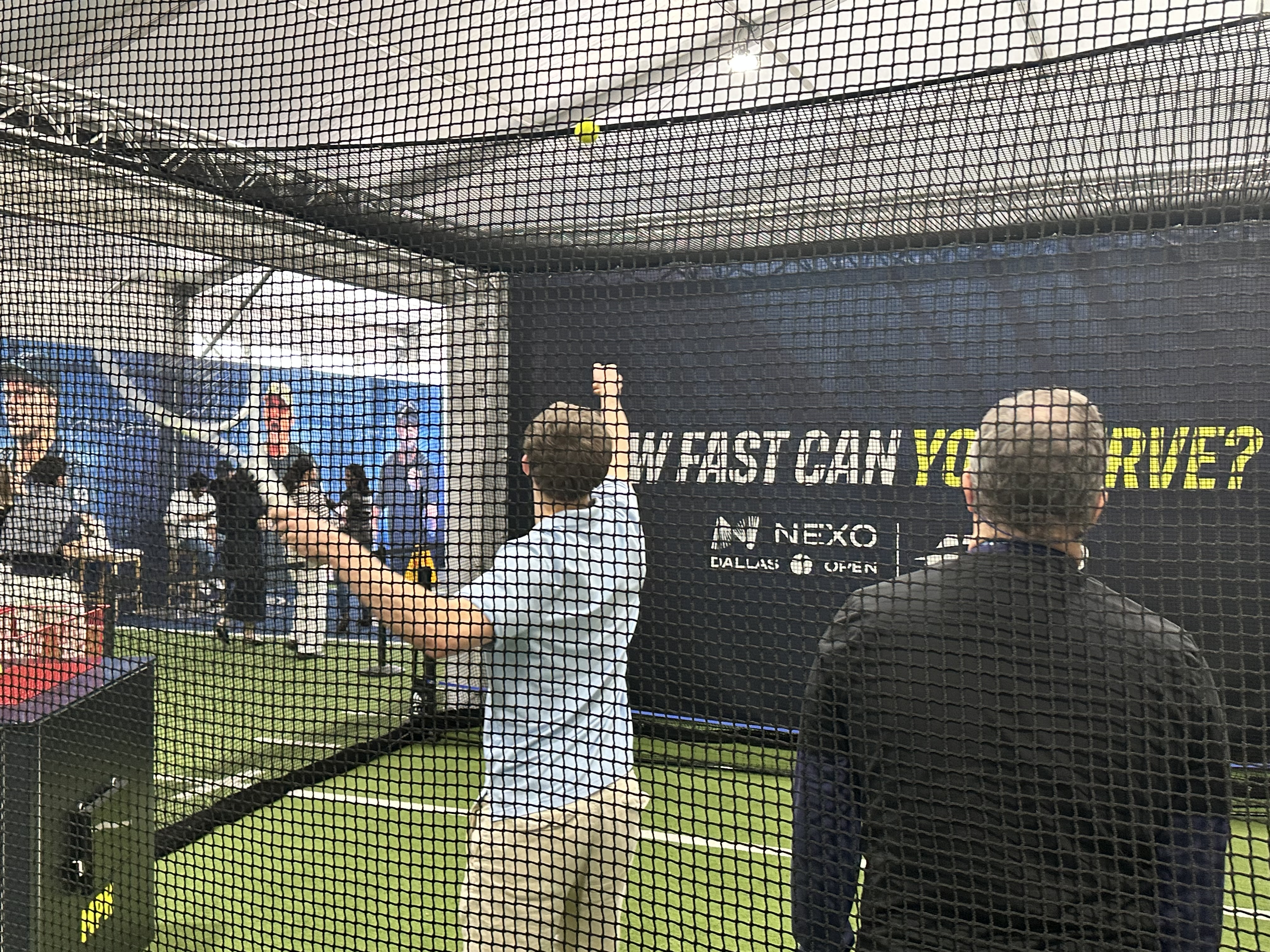 me serving a tennis ball